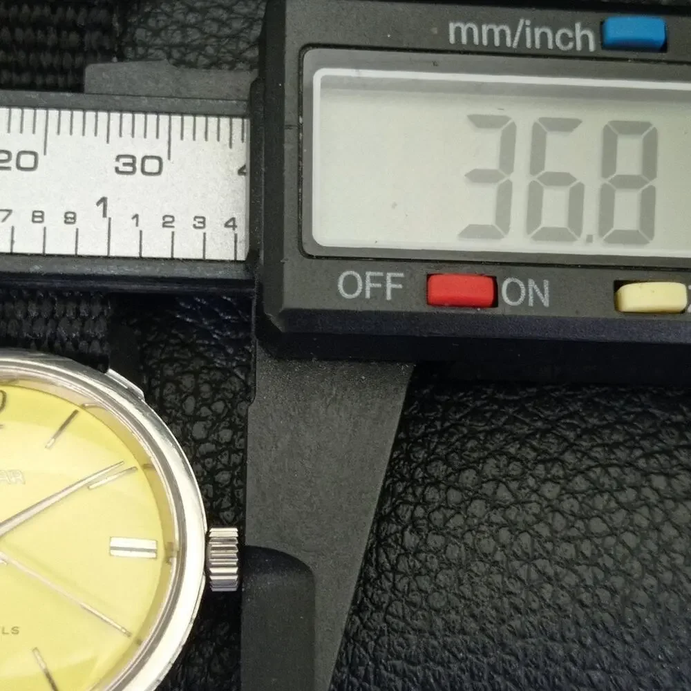 Vintage 1984 Enicar Automatic Mens Silver Watch & Yellow accents